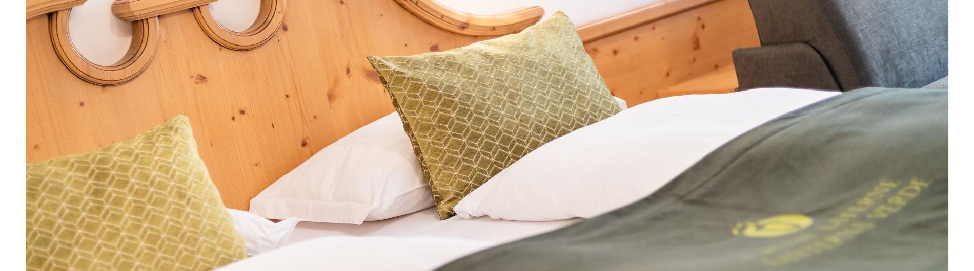 Double bed in the Comfort room.