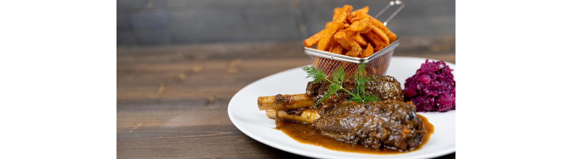 Venison shank with sweet potato fries